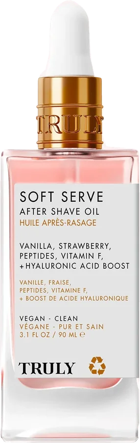 Frasco de vidrio rosado con gotero dorado de Truly Soft Serve After Shave Oil, 90 ml.